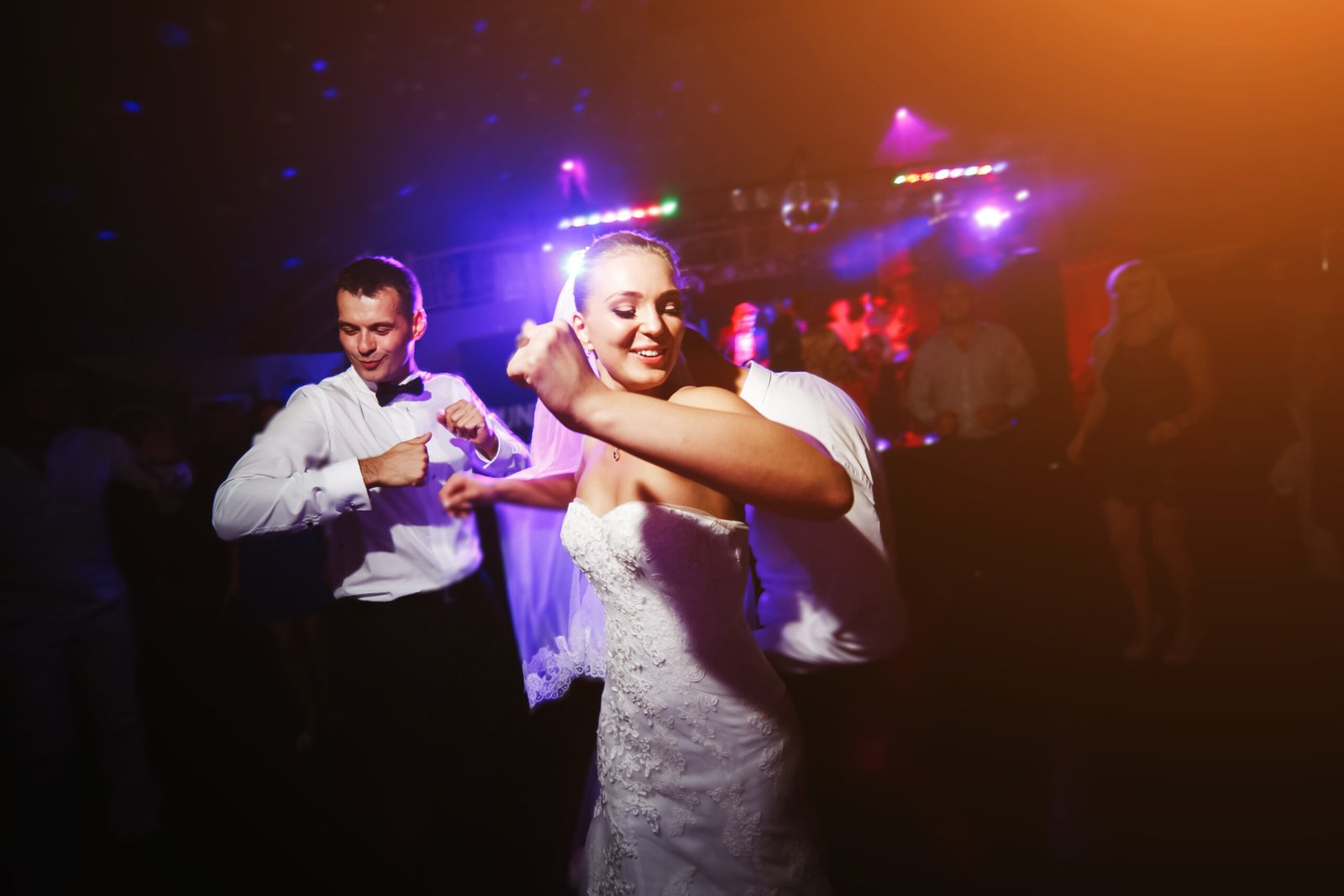 Packed vibrant wedding dancefloor